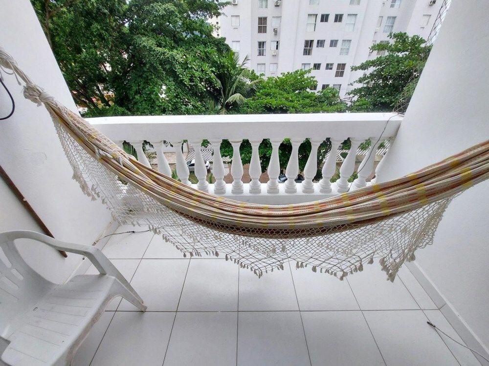 Ap 02 dorms - Enseada - com sacada, Ar-Cond, Wi-Fi, 01 vaga, Lado Praia
