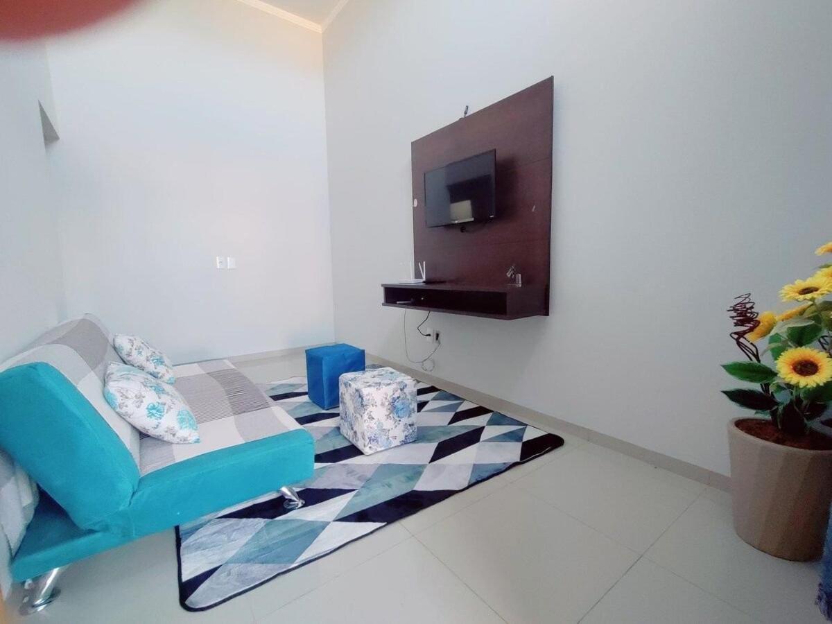 casa completa, 2 quartos com ar-condicionado, no centro hoteleiro