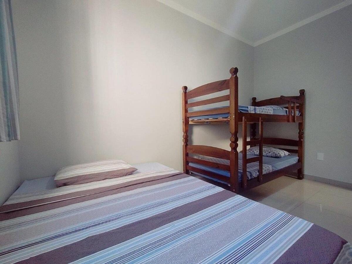 casa completa, 2 quartos com ar-condicionado, no centro hoteleiro