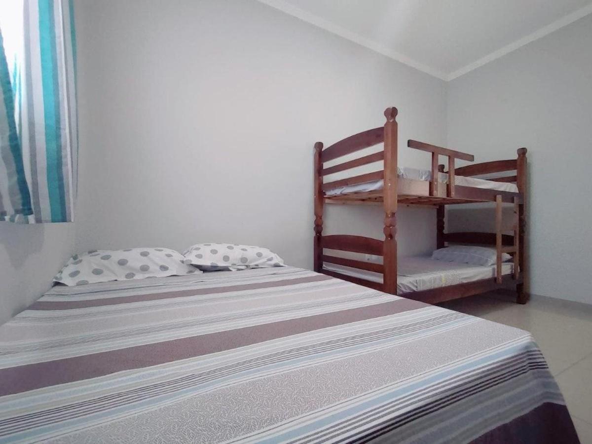 casa completa, 2 quartos com ar-condicionado, no centro hoteleiro
