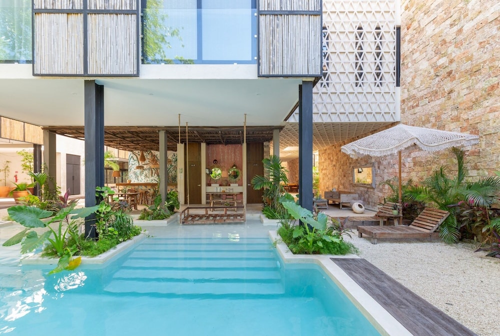 Fancy Stylish Condo Great Lounge Area and Pool in Aldea Zama High-speed Wifi Concierge
